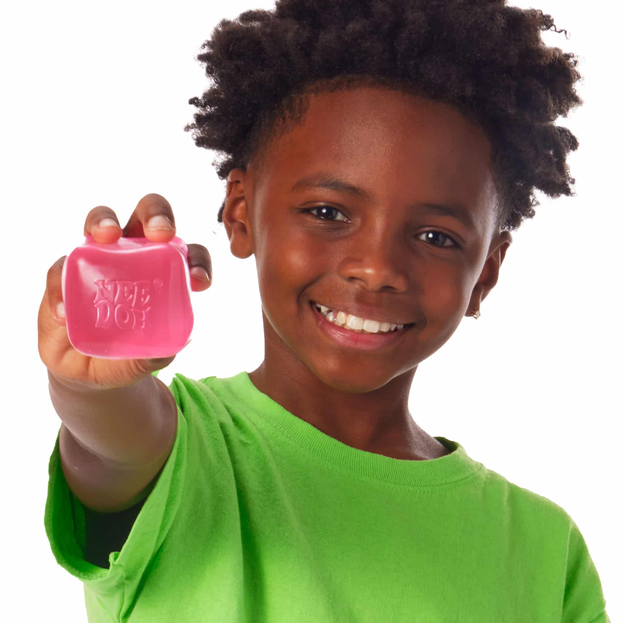 NeeDoh Nice Cube P2 Lifestyle of boy squeezing pink Nice Cube P2